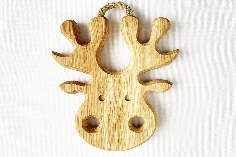 Oak trivet with a moose
