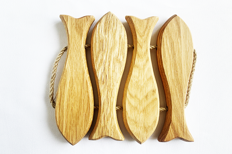 Fish-shaped oak trivet